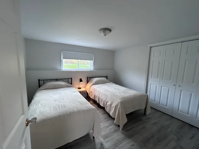 Furnished, Modern, Bright & spacious 2-bedroom ground-level apartment in a duplex - 1000 sq. ft.