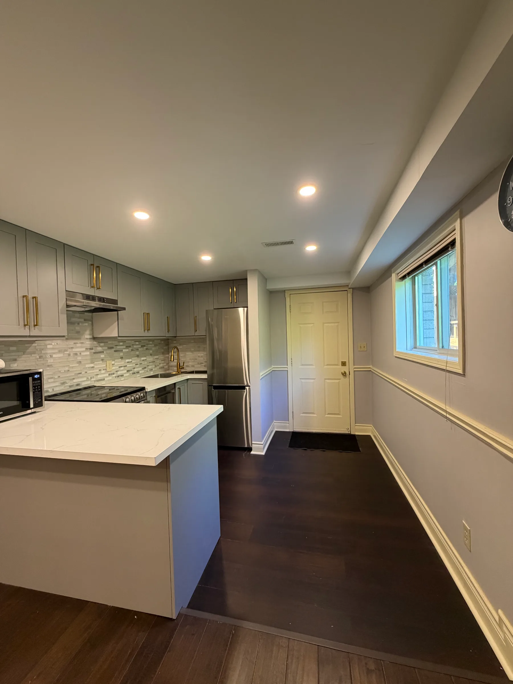 Never-lived-in private walkout ravine view unit.