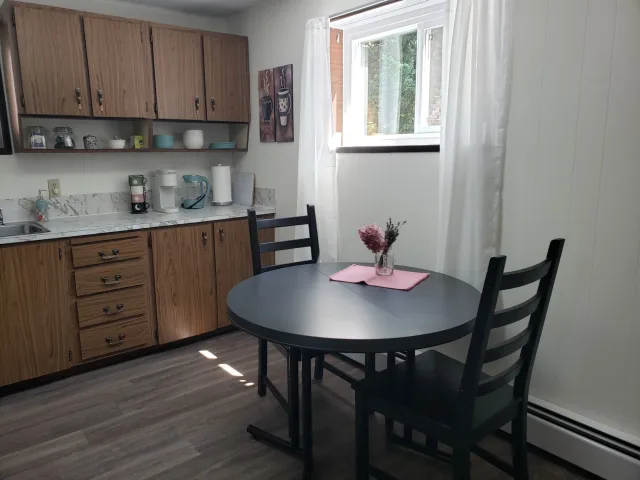Large and updated suite on a 1.3 acre property. Cat friendly. Washer and dryer in unit.
