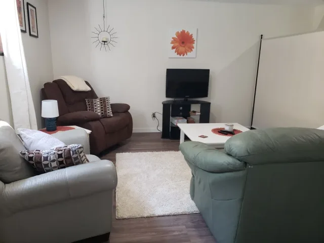 Large and updated suite on a 1.3 acre property. Cat friendly. Washer and dryer in unit.