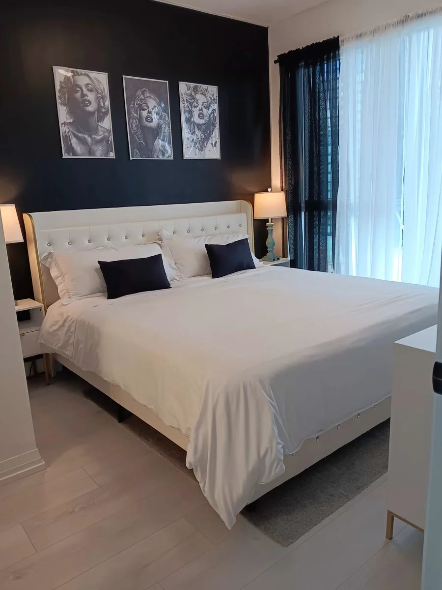Charming Cozy modern condo fully equipped . City views .close to all amenities. Transit 1 block away