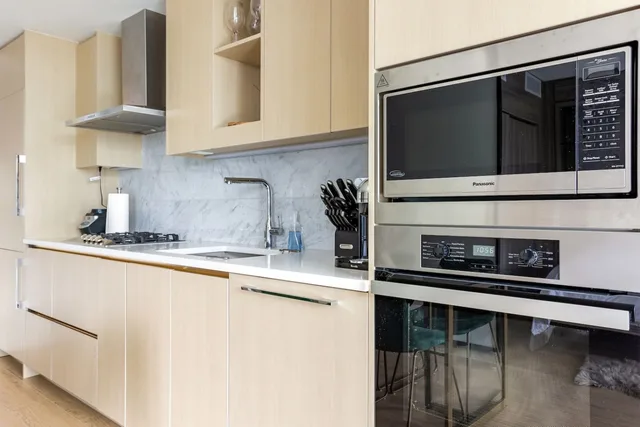 Modern 1-bedroom apartment with pool and gym.